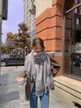Thick grey cashmere scarf with fringes worn by a model in a stylish urban street setting - Thickened Tassel Style (350g) / 200*70cm / Light Gray