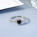Elegant silver ring featuring a heart-shaped black gemstone with pavé set crystals - Size 6 / Platinum + Black Zircon