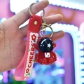 Red astronaut acrylic keychain with pink Cheers strap and glowing LED feature - Light-up Astronaut [Red]