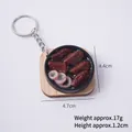 Miniature food keychain featuring realistic braised chicken wings and squid rings - Chicken Wings Teppanyaki - Keychain