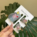 Close-up of cute grey hippo hair clips and claw clip set shown held by hand - Banana Peel Hippo Clip 3PCS Set