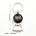 Detail view of silver bottle opener keychain with letter T badge and size dimensions - Letter T