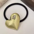 Brushed gold heart charm elastic hair tie with minimalist geometric cutout design - Single Hollow Heart / Gold
