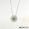 Close-up of silver sun pendant necklace with blue center stone and white zircons - Silver Evil Eye Sun