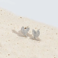 Elegant silver maple leaf stud earrings with sparkling cubic zirconia on a stone surface - Silver Dragonfly