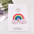 Close-up of glitter rainbow hair clip with clouds on pink fabric alligator clip detail - Smiling Rainbow Cloud