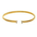 Detail of golden Tubogas choker necklace featuring double-row clear rhinestones on ends - 8mm Choker / Gold