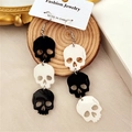 Long dangle earrings featuring black and white skull pendant designs for Halloween - Long Multi-Skull