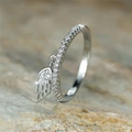 Elegant silver wing feather ring with sparkling zircon charms on natural stone - US 7 / White Gold