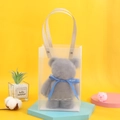 Gray plush bear towel in a frosted gift bag with blue ribbon on yellow background - 30x30cm (No Packaging) / Gray