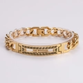Detail van vergulde roestvrijstalen Cubaanse schakelarmband met Grieks sleutelpatroon - Goud Griekse Sleutel Holle Smalle Stijl
