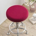 Red waffle texture round stool cover protector on swivel chair in home setting - Burgundy