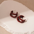 Detailed view of burgundy C-shape double hoop earrings on white stone surface - Wine Red (Silver Pin - Multi-layer C-shape)