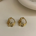 Macro detail of gold irregular hollow stud earrings with a unique textured lava finish - 26# Lava Folded Texture Hollow Studs