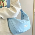 Light blue nylon crescent crossbody bag with wide shoulder strap and brand label - 24cm x 21cm x 11cm / Blue