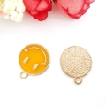 Detailed view of yellow enamel smiley face charms with gold metal finish for DIY jewelry - Large 16x19mm / Yellow