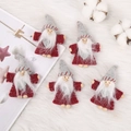Set of five handmade red and grey Christmas felt gnomes on soft white fur background - 08 Heart Gnome Red