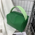 Dark green minimalist cosmetic pouch with textured light green woven handle - Green
