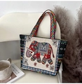Ethnic beige canvas tote bag with colorful elephant embroidery and geometric patterned straps - Red Elephant