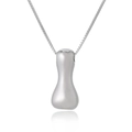 Close-up of a polished silver irregular hourglass pendant on a delicate chain necklace - Letter I