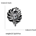 Vintage grey floral alloy brooch with large pear-shaped rhinestone and size markers - Gunmetal