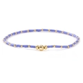 Minimalist purple matte beads and gold metal accents on a stackable beaded bracelet - Purple