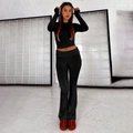 Dames set met zwarte crop top met lange mouwen en flared broek met een slanke pasvorm - XS / Set met zwarte Zirkonia