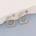 Detailed close-up of silver irregular square earrings with hammered texture and butterfly back - Silver Style K7-63
