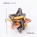 Jouet casse-tête en métal avec quatre triangles imbriqués en argent, or, cuivre et noir - Grand Triangle 4D
