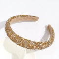 Detailed view of padded headband with golden rhinestones and white faux pearls - Yellow
