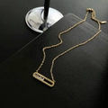 Minimalist 18K gold plated necklace with three moving zircons in oval pendant - Titanium Steel Zirconia Necklace / Gold