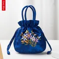 Navy blue satin handbag with traditional floral ribbon embroidery and drawstring closure - Navy Blue