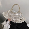 Elegante bolso de jaula dorada con grandes perlas blancas y asa de perlas - Blanco