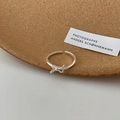 Detail of S925 sterling silver bow ring featuring an adjustable open band design - S925 Silver Bow Ring (J4073)