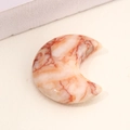 Polished moon-shaped red agate crystal pendant with natural white marble texture - Red Network Jasper