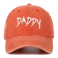 Close-up of DADDY embroidery on vintage washed orange cotton baseball cap with curved brim - One Size / Orange
