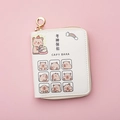 Detailed close-up of white PU leather Capybara coin purse with gold zipper and lucky text - White - Study Blessings