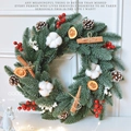 Artificial Christmas wreath with pine needles, red berries, cotton, and cinnamon sticks - Cotton Red Berry Wreath