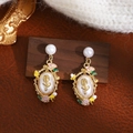 Macro shot of French vintage square pearl drop earrings with colorful enamel flowers - Gold Rose Relief Pearl Enamel (E7896)