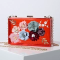 Elegant red acrylic evening clutch bag with colorful fabric floral decor and gold chain - Translucent Red