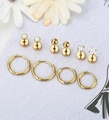 10-piece gold earring set featuring geometric studs, hoops, and zircon saturn charms - Yellow