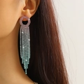 Macro shot of long tassel rhinestone earrings with pink to blue gradient on a model - Pink and Blue Gradient (KE023P-SB)