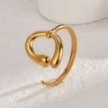 Macro detail of a 14K gold minimalist C-shaped open ring with unique twisted design - R729-C (Abstract Twisted Style)