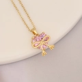 Macro shot of 18K gold plated pink heart pendant with a delicate golden butterfly detail - Heart Shape Pink Bow Pendant (13#)