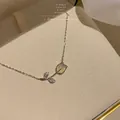 Elegant tulip pendant necklace with cream cat eye stone and silver zircon chain - Luxury Tulip Necklace