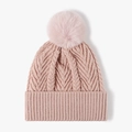 Pink chunky knit beanie for women featuring a fluffy pompom and wavy texture pattern - Pink