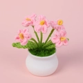 Handmade crochet pink forget-me-not flowers in a white ceramic pot for home office decor - Pink