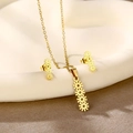 Detailed view of golden stainless steel necklace and earrings set with geometric motifs - Geometric Flower (TZ-416)