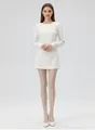 Close-up of off-white vintage twist textured knit pantyhose on female model - One Size (40-75kg) / Cream