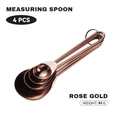 Set of 4 rose gold stainless steel measuring spoons with ring holder and markings - Rose Gold Wire Handle Measuring Spoons Set of 4